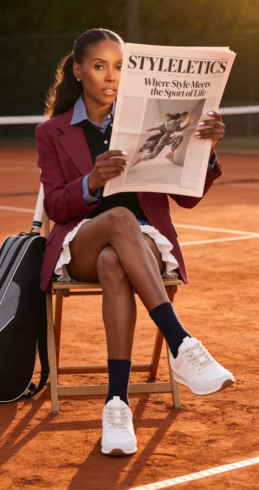 June Ambrose wearing the Nuvra sneaker in white