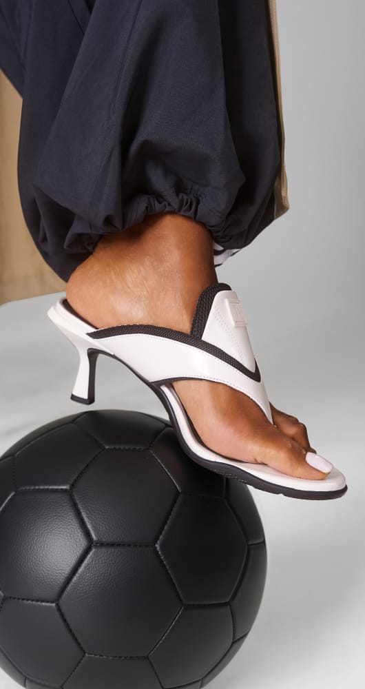 June Ambrose x Naturalizer Ravyn heeled thong in white