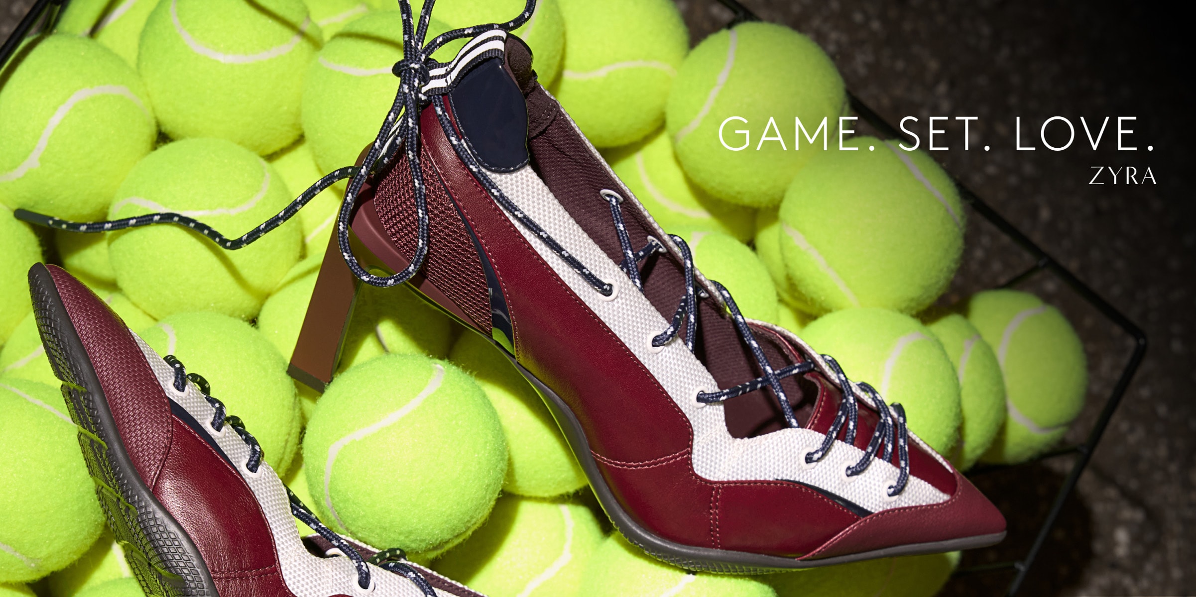 product shot of the June Ambrose x Naturalizer Zyra pump in molten noir on tennis balls