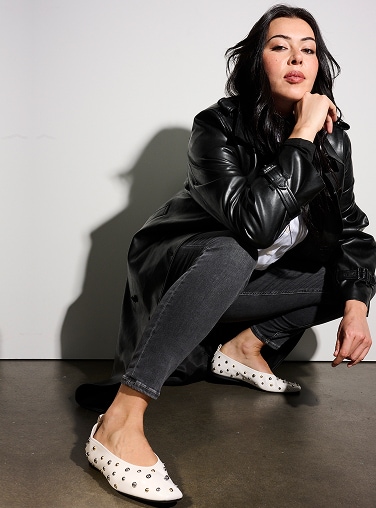 model wearing the Carla ballet flat in white stud